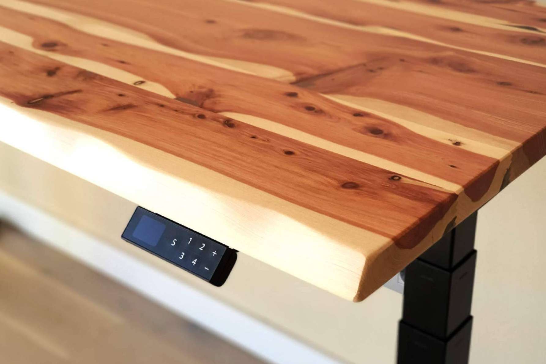 ¿Cuáles son los beneficios de trabajar con escritorios ergonómicos elevables?, por ErgoNatureWood